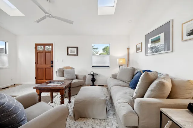 a living room with furniture and a couch
