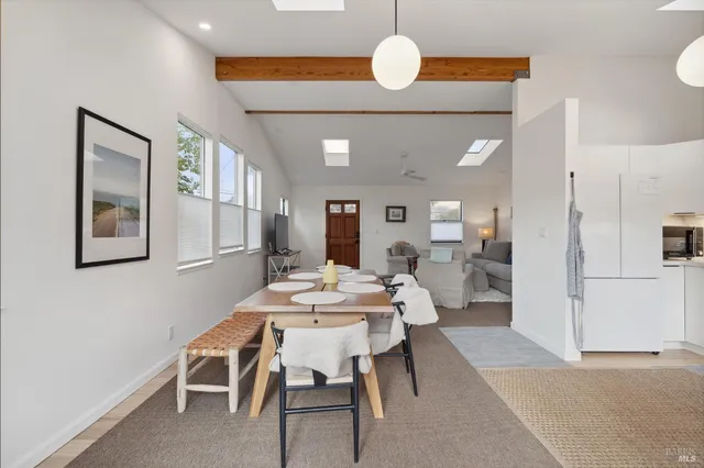 a view of a dining room with furniture