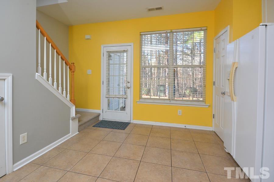8249 City Loft Court Raleigh, NC 27613 - Photo 16 of 28 a view of an entryway with a tub and windows