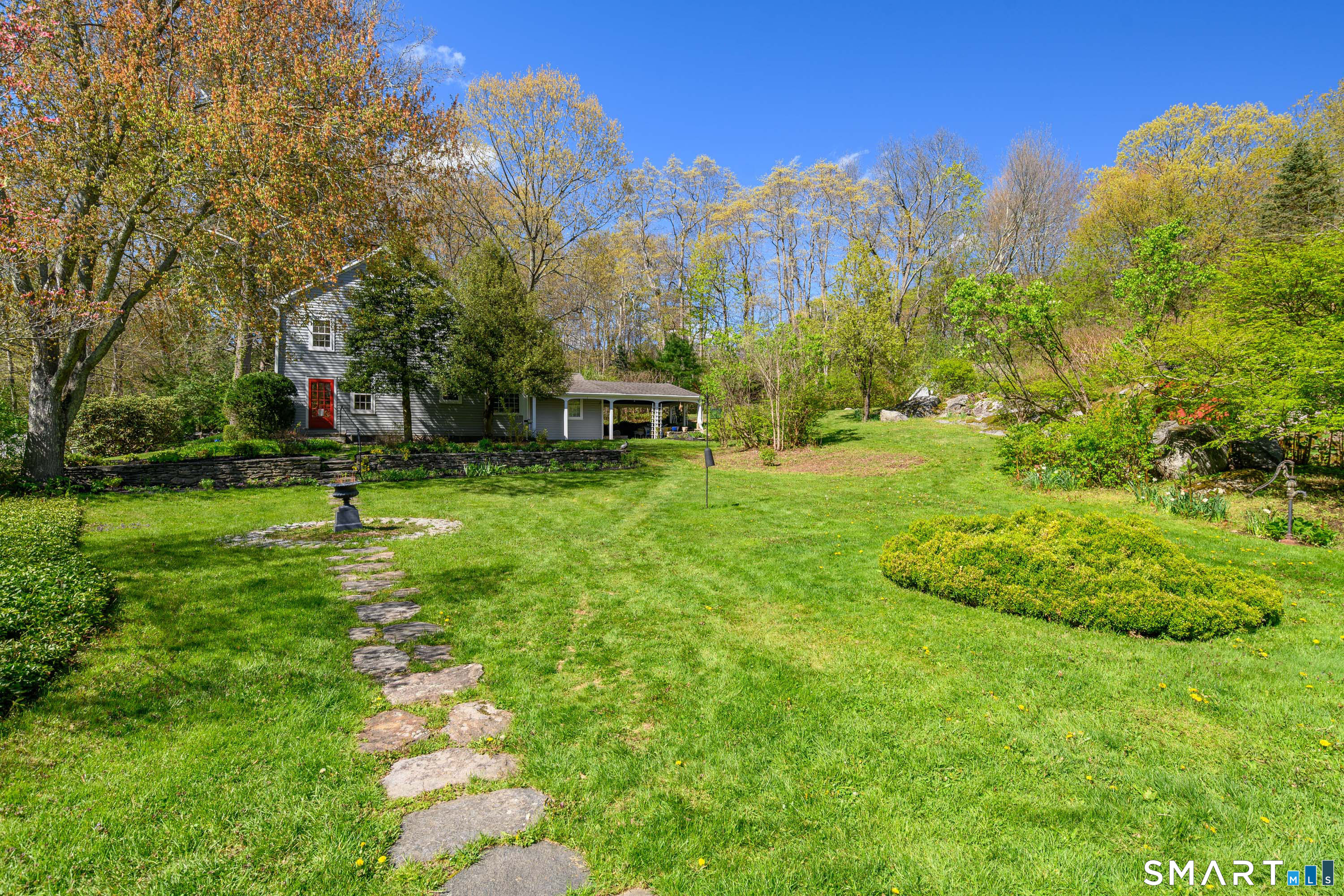 6 High Rock Road Newtown, CT 06482 - Photo 5 of 40 a view of a park with large trees