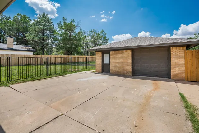 a view of a backyard with a garden