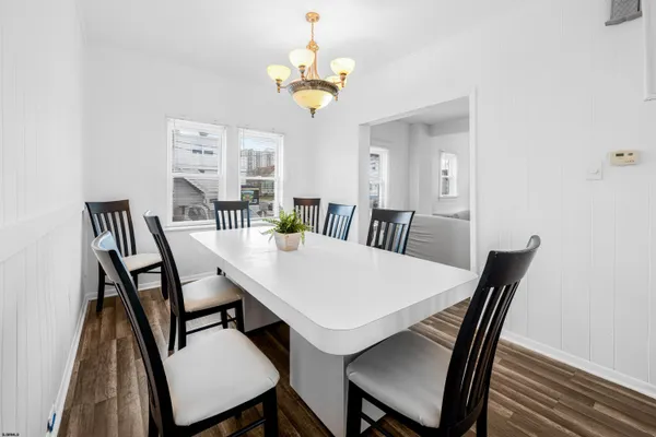 a kitchen with stainless steel appliances a refrigerator and a stove top oven