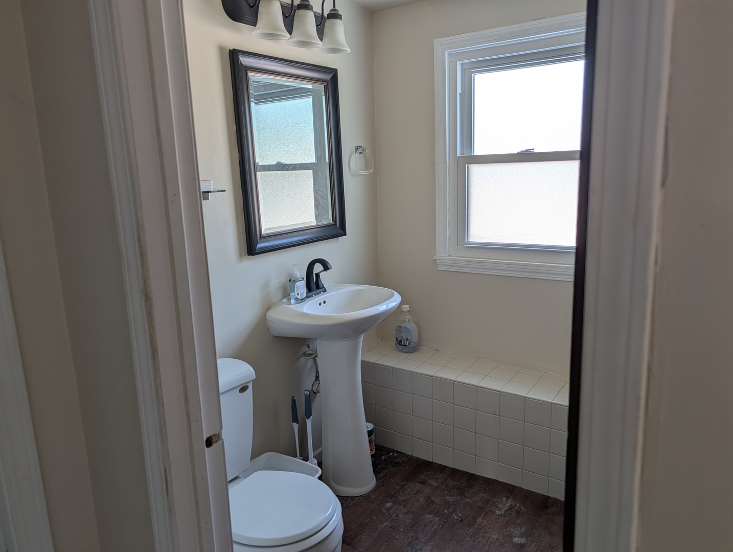 10754 Lyman Avenue Chicago Ridge, IL 60415 - Photo 17 of 17 a bathroom with a sink toilet and shower