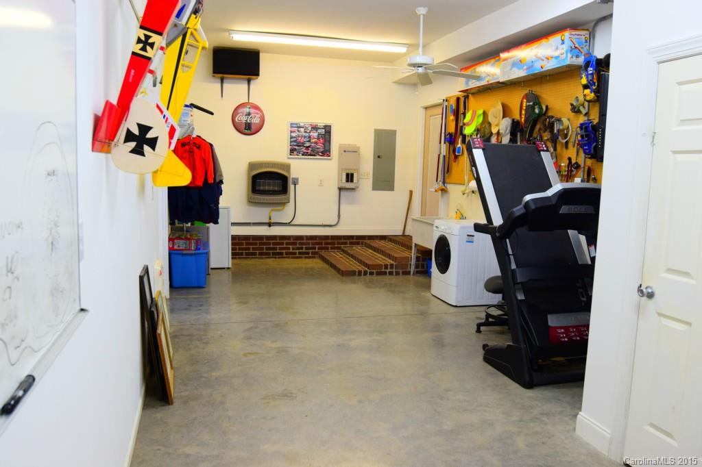 4301 Sincerity Road, Unit 2 Monroe, NC 28110 - Photo 22 of 24 a view of play room with gym equipment