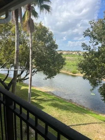 a view of a lake from a balcony