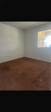 a view of room and front door