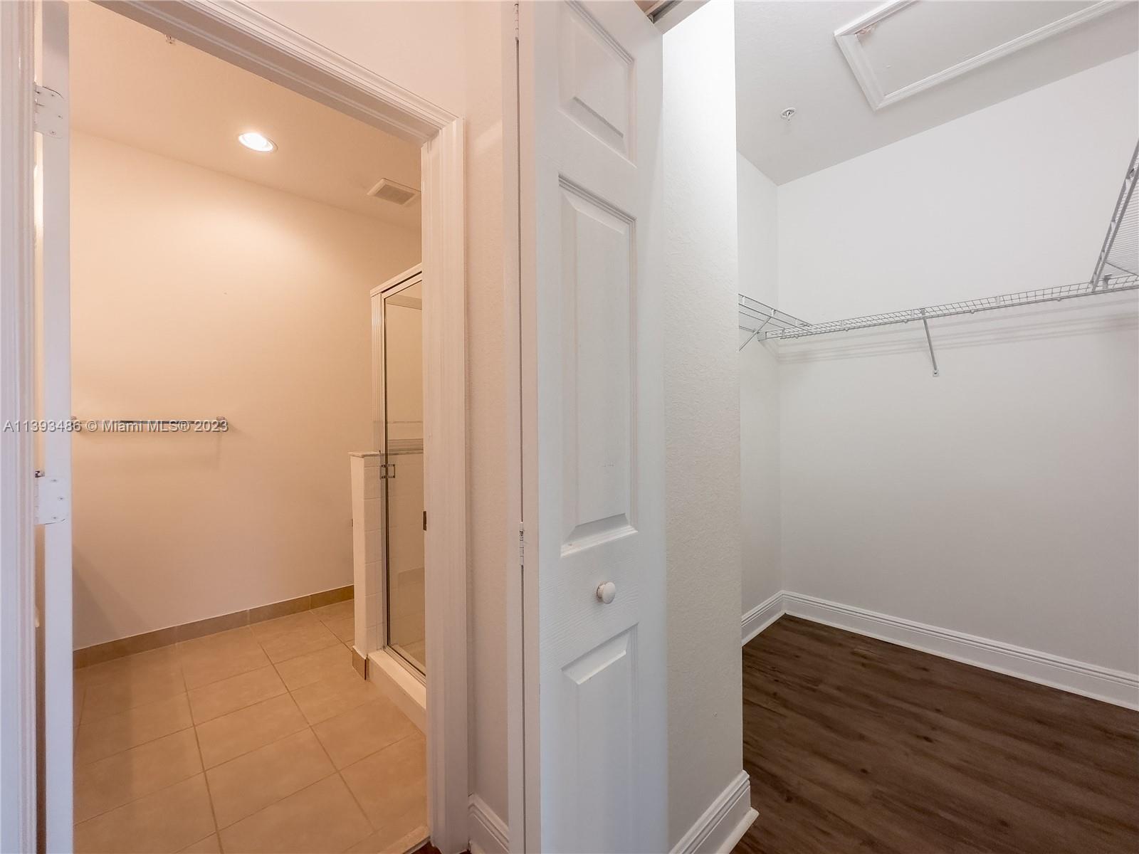 865 Southwest 147th Avenue, Unit 1908 Pembroke Pines, FL 33027 - Photo 19 of 30 a view of small space with racks on the wall
