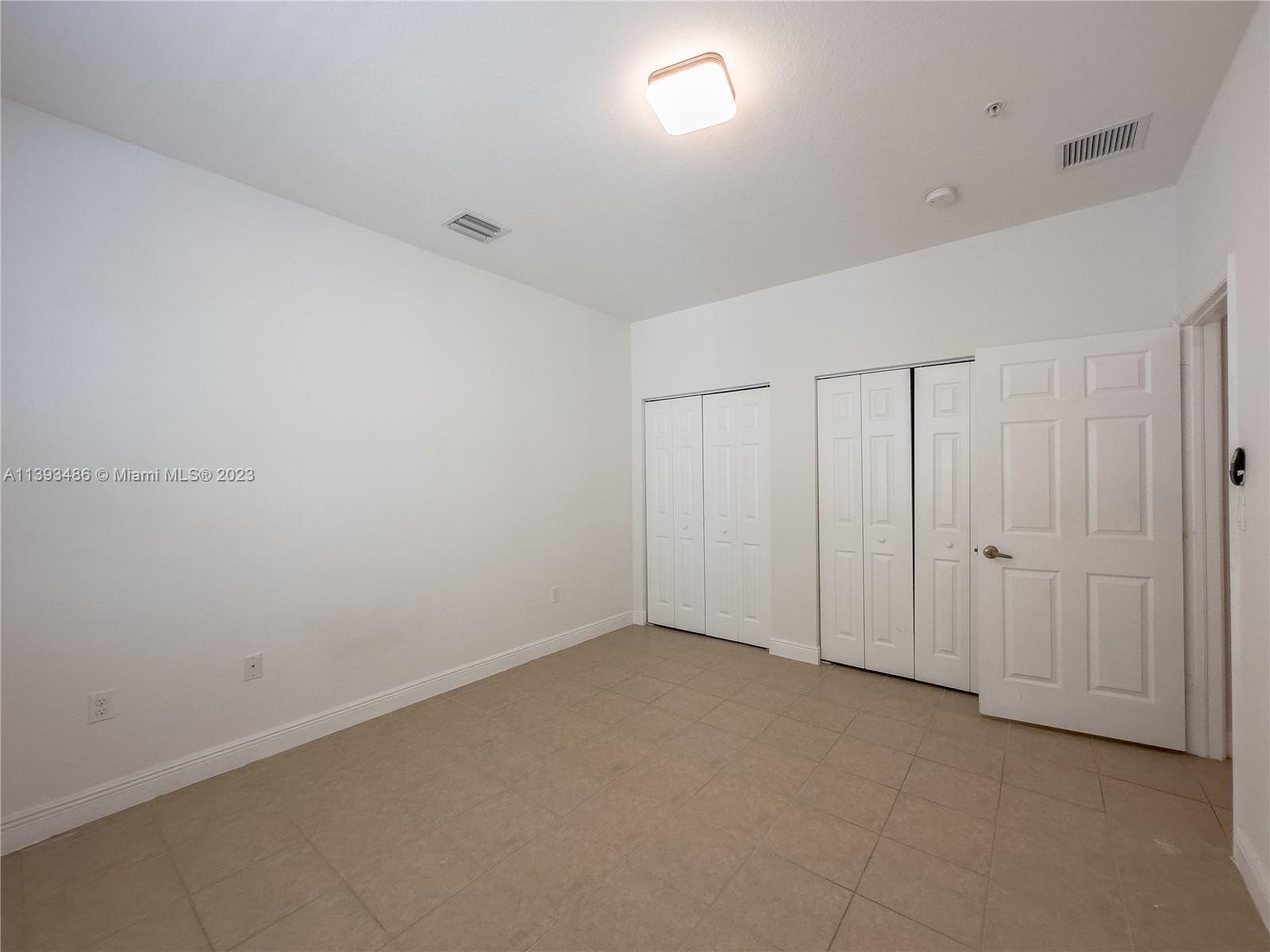 865 Southwest 147th Avenue, Unit 1908 Pembroke Pines, FL 33027 - Photo 10 of 30 a view of an empty room