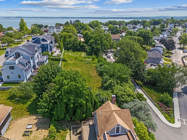 an aerial view of a house with a garden