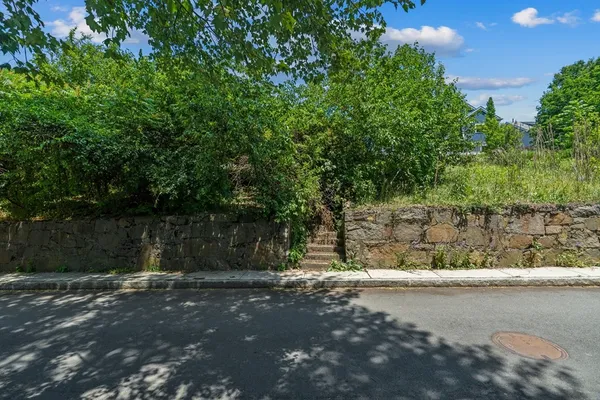 a view of a backyard of a house