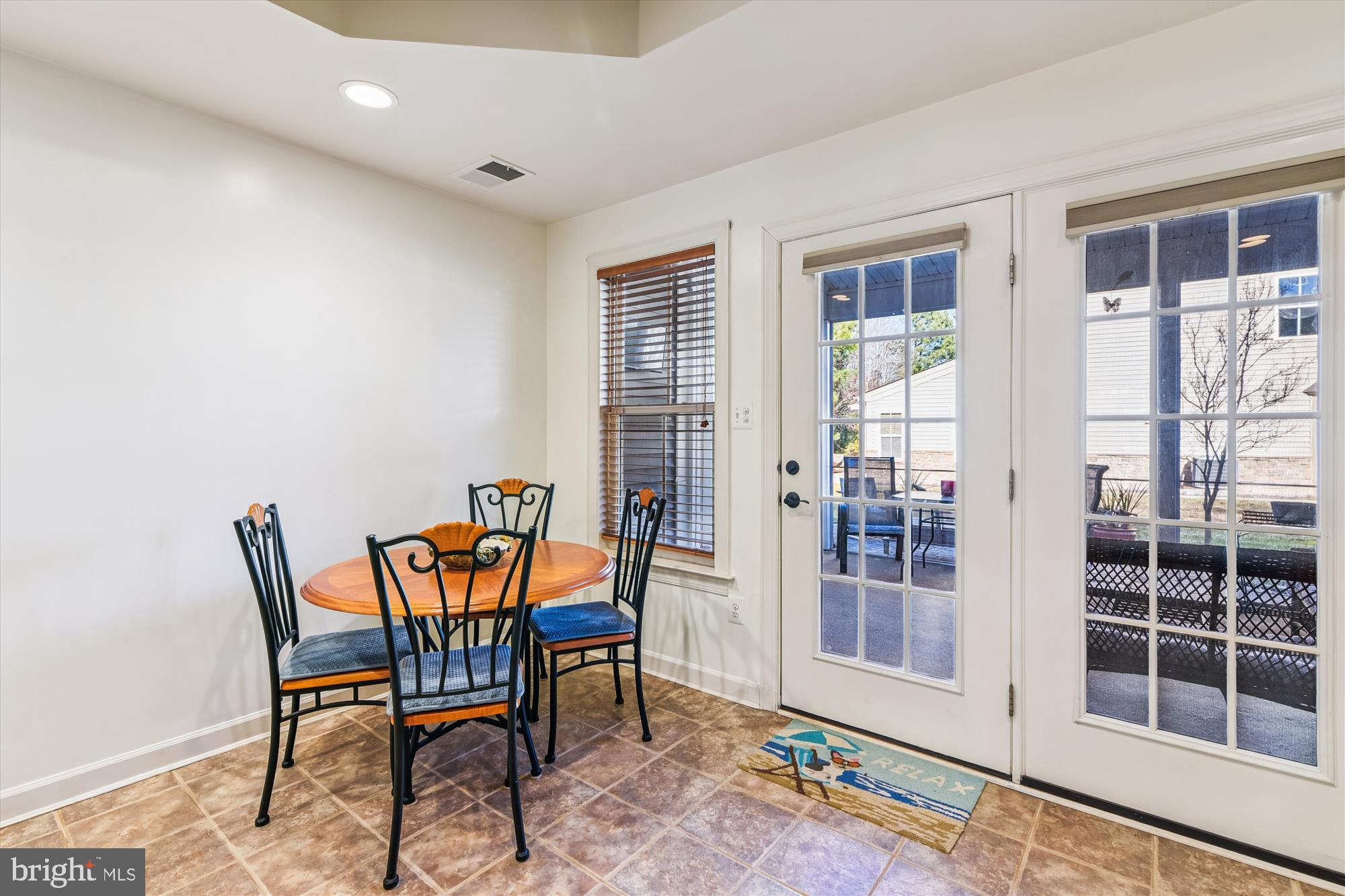 36403 Junco Road, Unit 211B Ocean View, DE 19970 - Photo 20 of 78 Breakfast Area leads to screened porch