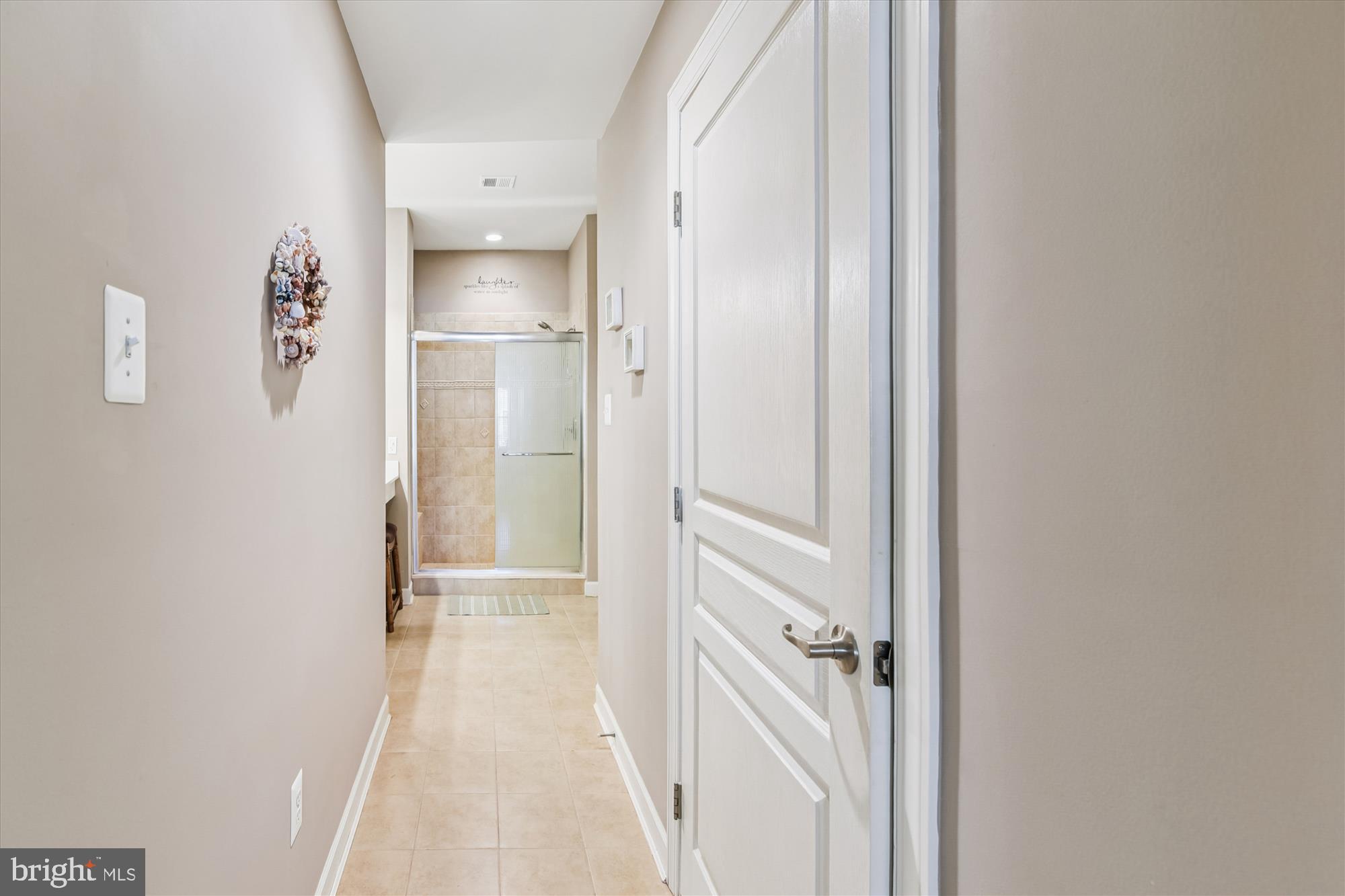 36403 Junco Road, Unit 211B Ocean View, DE 19970 - Photo 27 of 78 Hall to PRBath (door on R is walk-in closet)