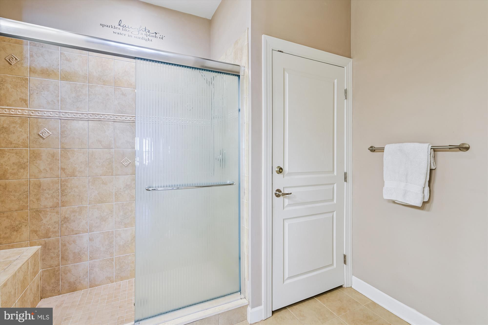 36403 Junco Road, Unit 211B Ocean View, DE 19970 - Photo 29 of 78 Primary Bath, tiled shower & linen closet