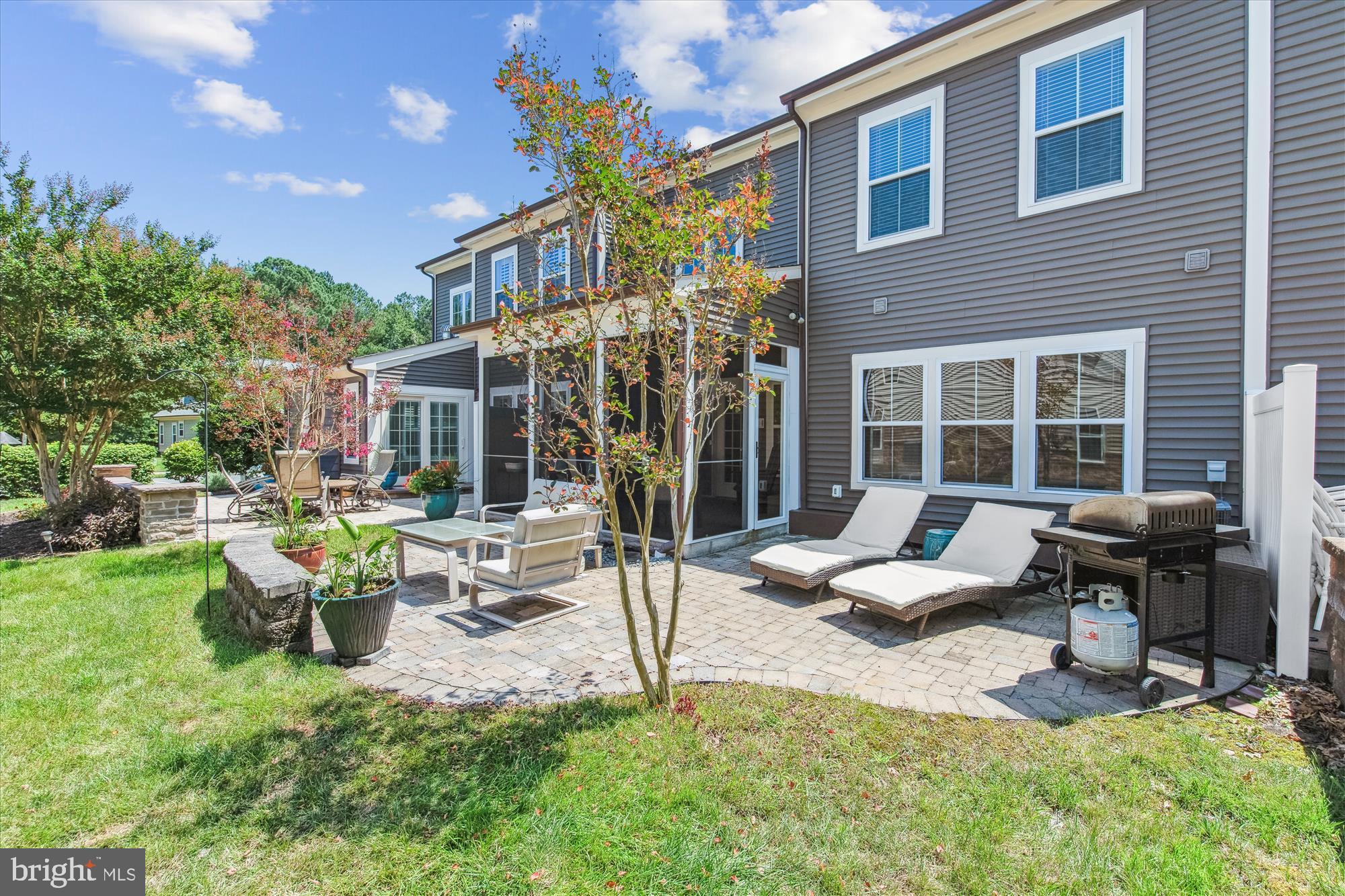 36403 Junco Road, Unit 211B Ocean View, DE 19970 - Photo 51 of 78 Stone patio offers a great spot to enjoy the day