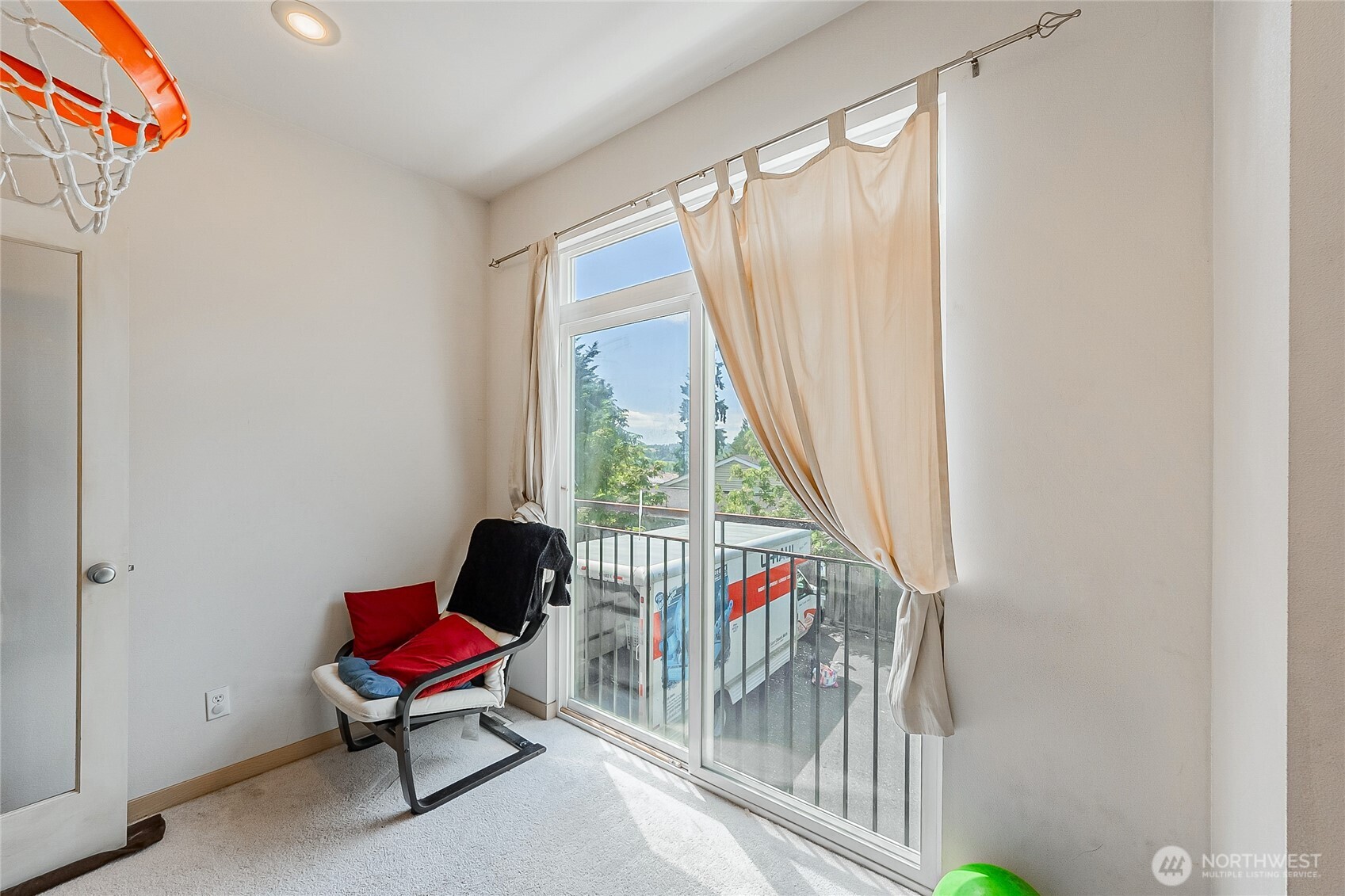 13005 64th Avenue South, Unit B117 Seattle, WA 98178 - Photo 21 of 37 a living room with furniture and a window