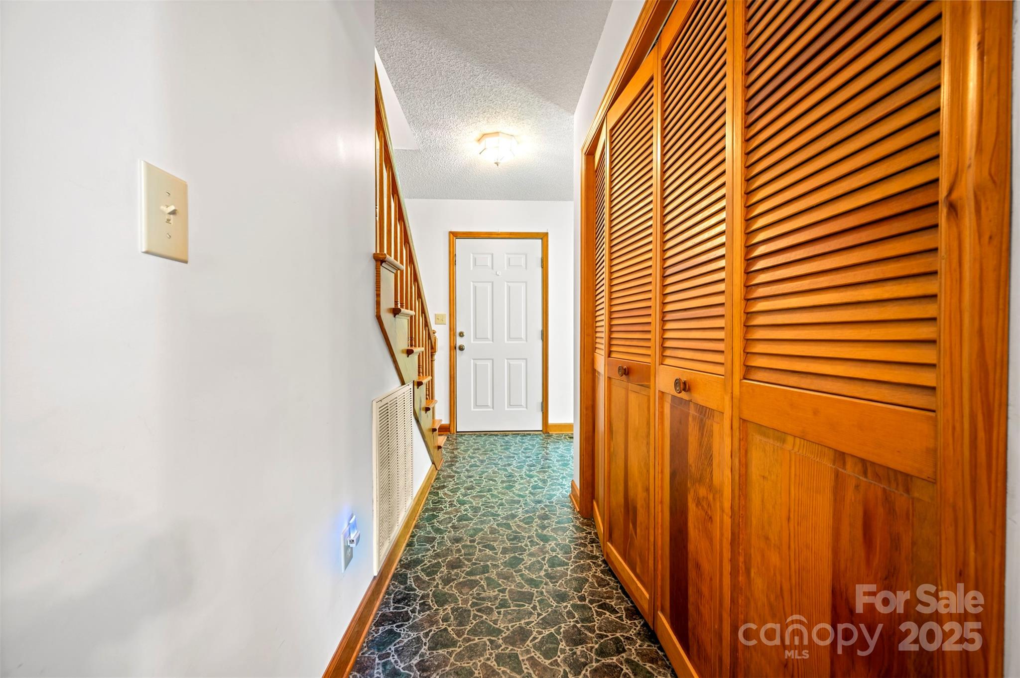 49 Meadowbrook Road Rutherfordton, NC 28139 - Photo 15 of 34 a view of a hallway with wooden floor and stairs