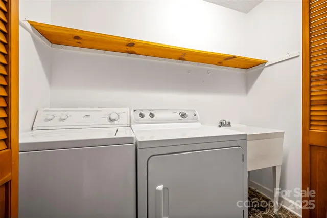 a utility room with dryer and washer