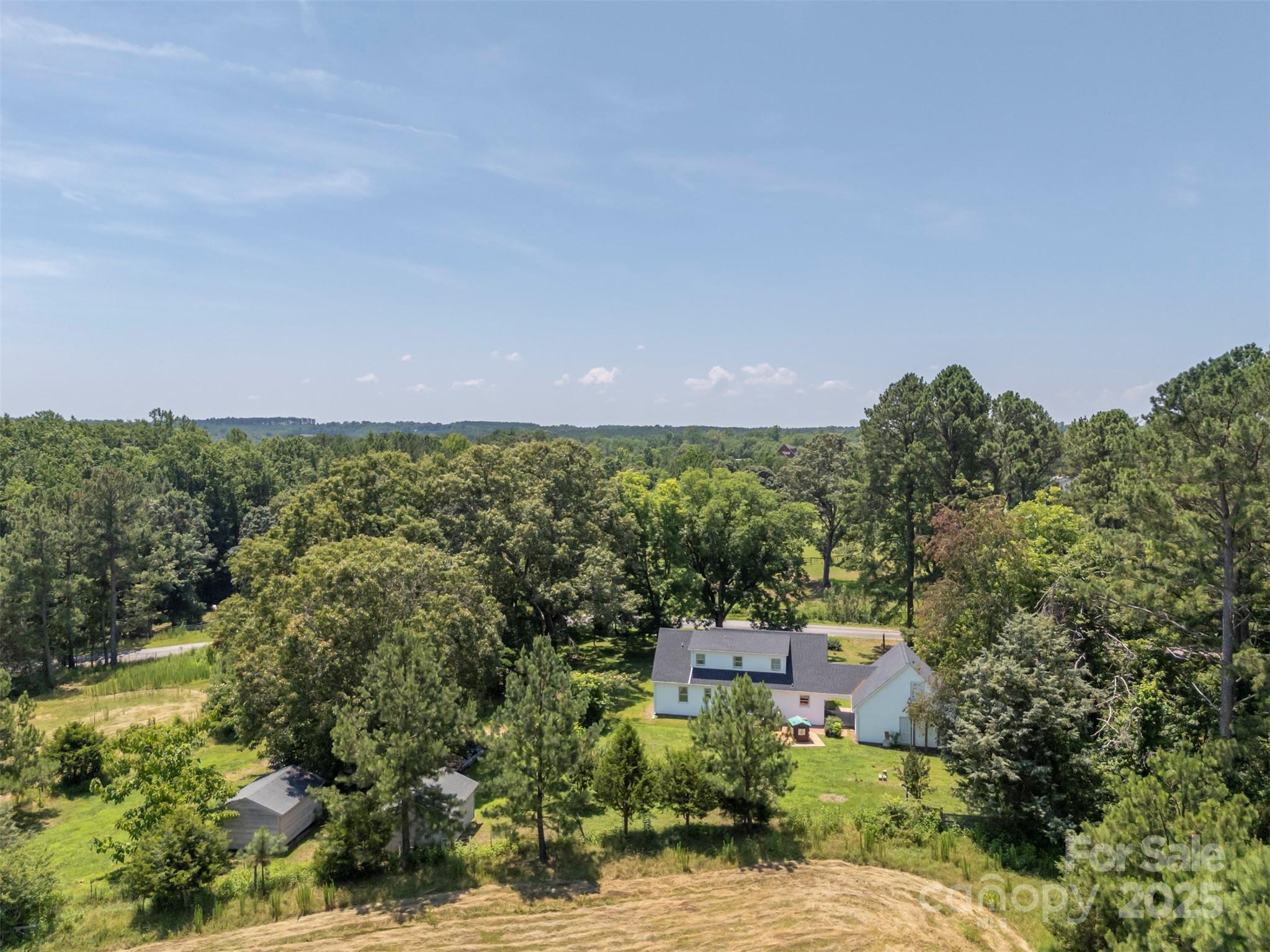 49 Meadowbrook Road Rutherfordton, NC 28139 - Photo 2 of 34 an aerial view of a house with a yard