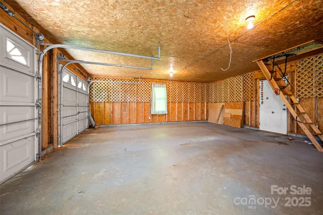 a big yard with lots of green space and deers