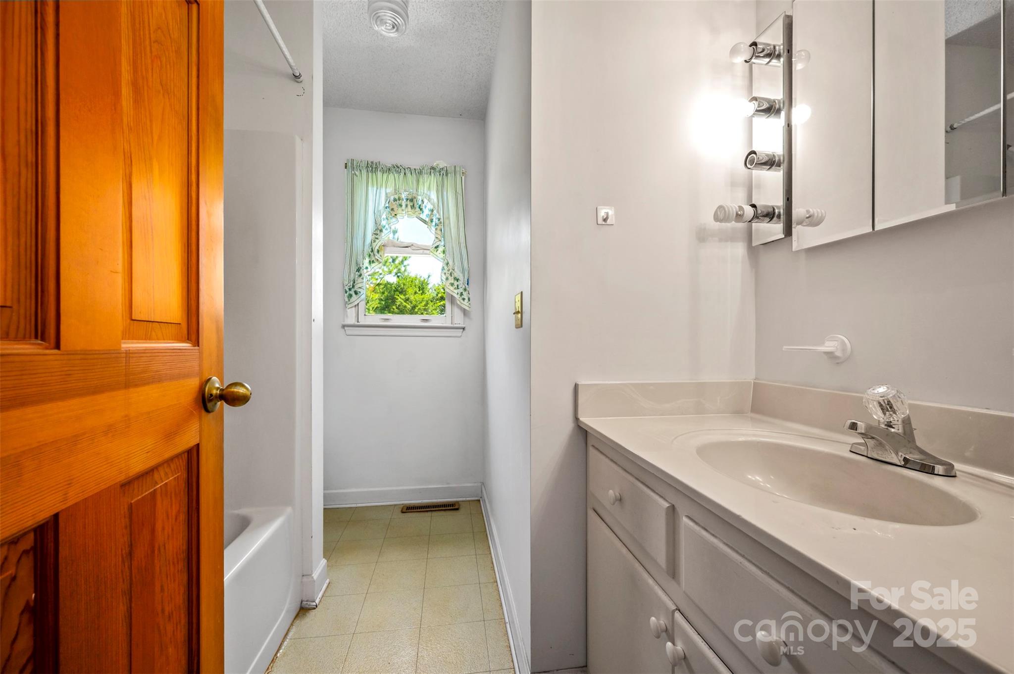 49 Meadowbrook Road Rutherfordton, NC 28139 - Photo 10 of 34 a bathroom with a sink and a mirror