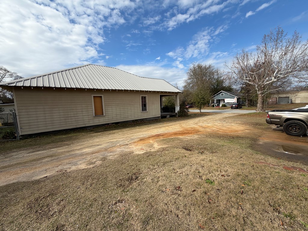 1124 20th Street Columbus, GA 31901 - Photo 16 of 30 a view of a house with a yard
