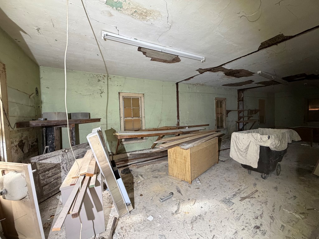 1124 20th Street Columbus, GA 31901 - Photo 19 of 30 a large kitchen with a table and chairs