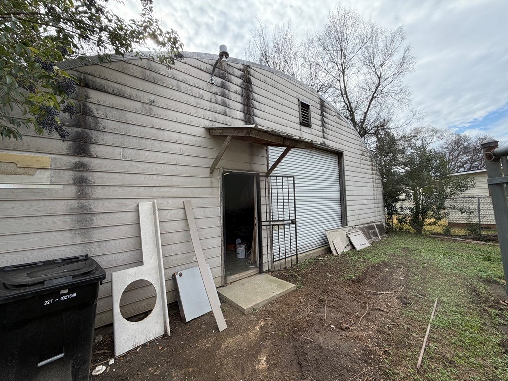 1124 20th Street Columbus, GA 31901 - Photo 3 of 30 a front view of a house with garden