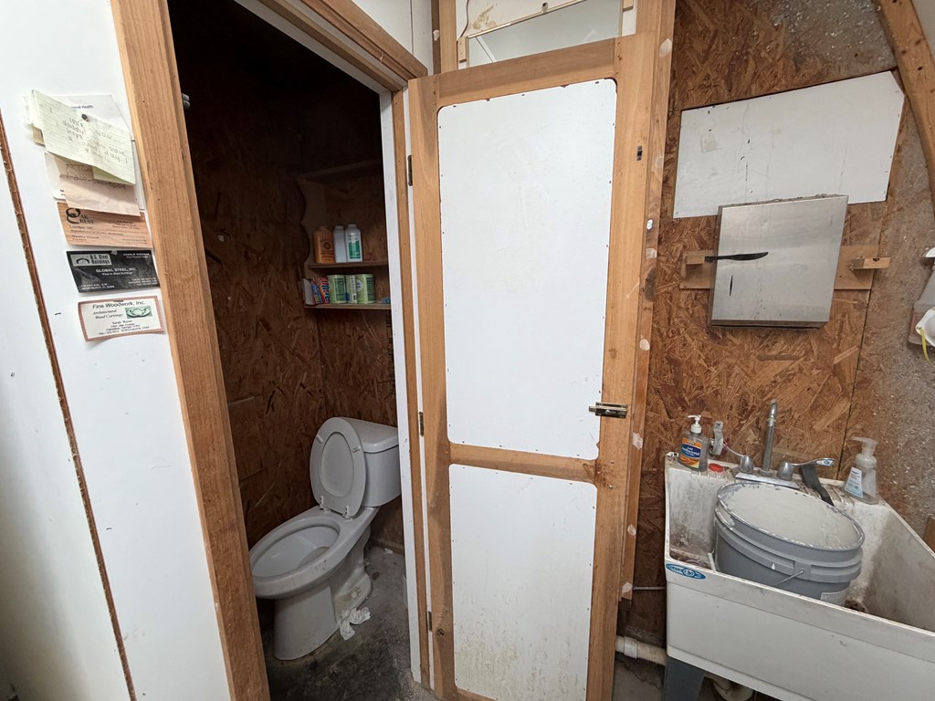 1124 20th Street Columbus, GA 31901 - Photo 8 of 30 a bathroom with a sink and a toilet