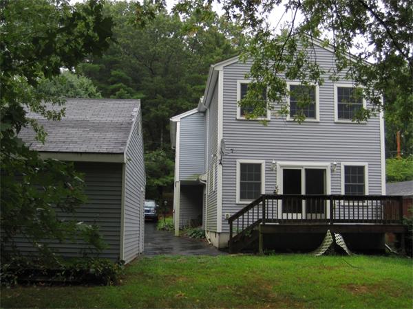 16 Overlook Road Wayland, MA 01778 - Photo 1 of 1 a view of a house with a yard and sitting area