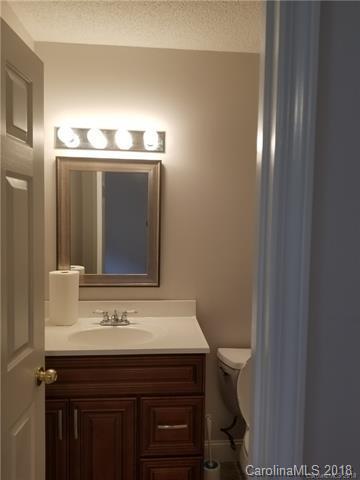 2286 Beth Haven Church Road, Unit 2286 Denver, NC 28037 - Photo 11 of 15 a bathroom with a sink and a mirror