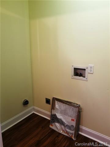 2286 Beth Haven Church Road, Unit 2286 Denver, NC 28037 - Photo 15 of 15 a view of room with hardwood floor and cabinet