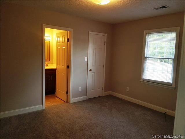 2286 Beth Haven Church Road, Unit 2286 Denver, NC 28037 - Photo 3 of 15 an empty room with windows and closet