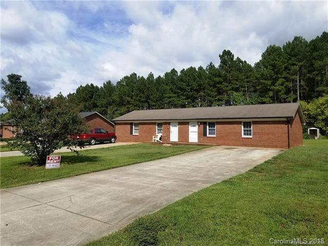 2286 Beth Haven Church Road, Unit 2286 Denver, NC 28037 - Photo 4 of 15 a front view of a house with garden
