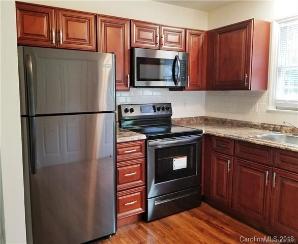 2286 Beth Haven Church Road, Unit 2286 Denver, NC 28037 - Photo 6 of 15 a kitchen with stainless steel appliances granite countertop a refrigerator stove and microwave