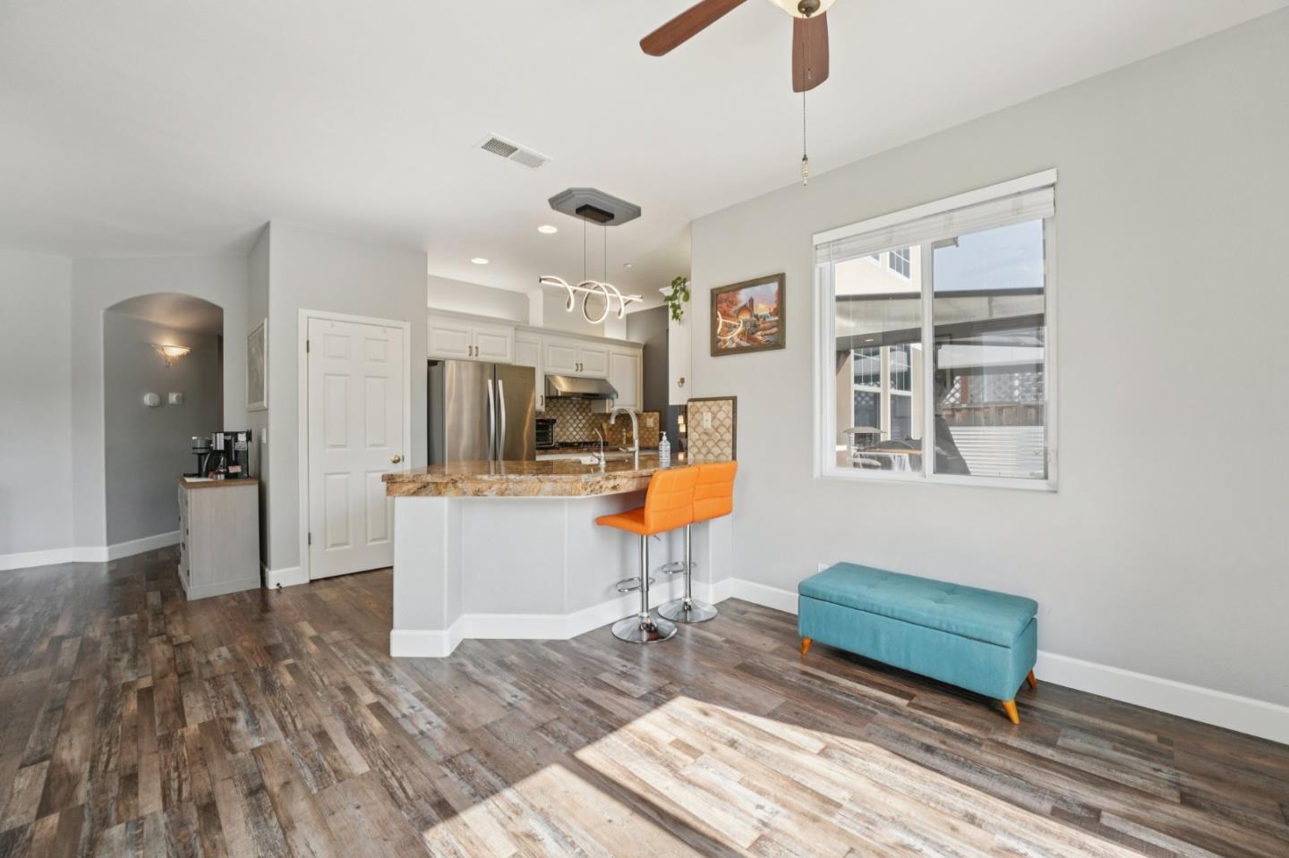 476 Arcadia Way Salinas, CA 93906 - Photo 14 of 40 a living room with furniture and a wooden floor