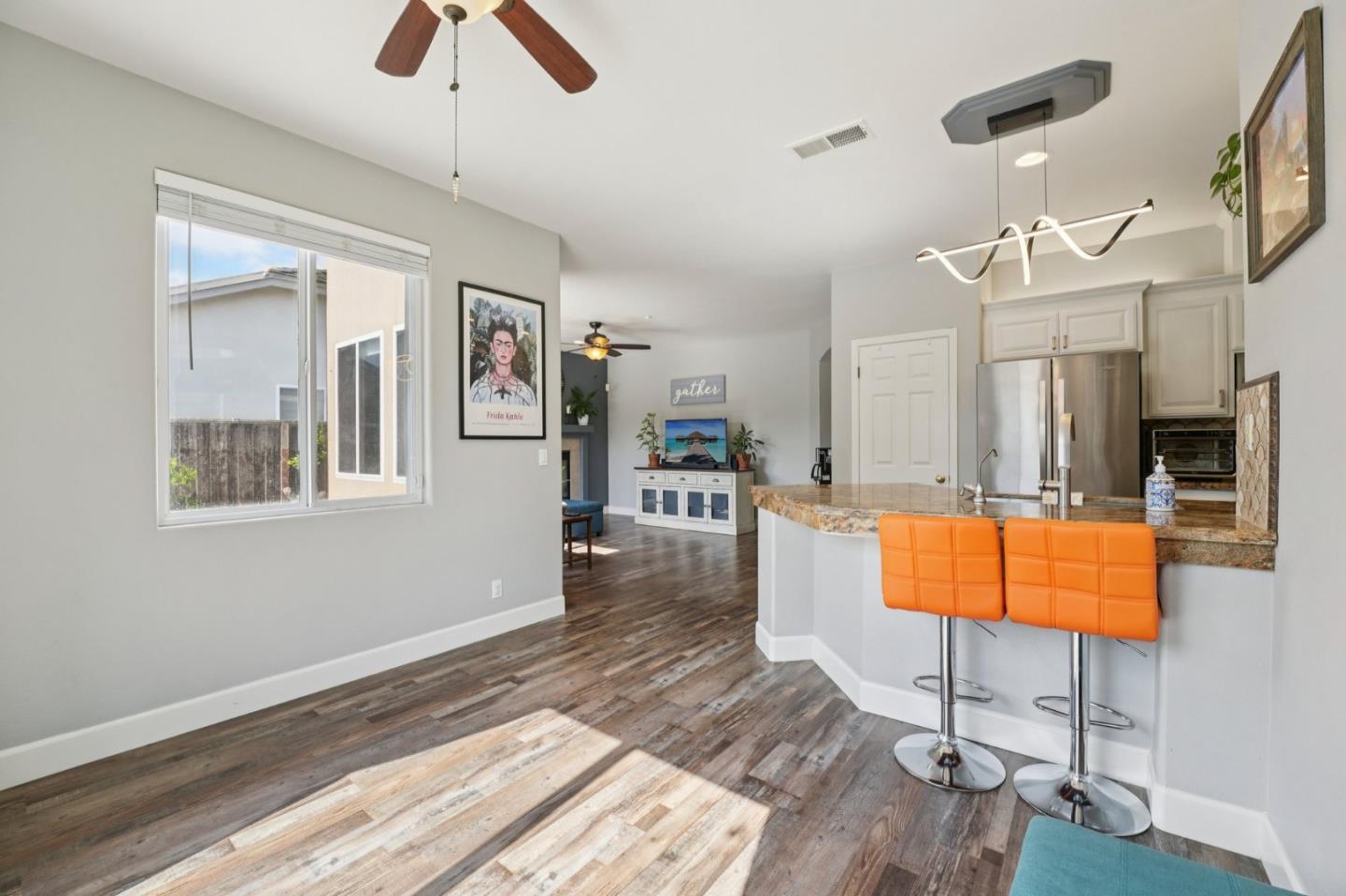 476 Arcadia Way Salinas, CA 93906 - Photo 15 of 40 a living room with furniture and a flat screen tv