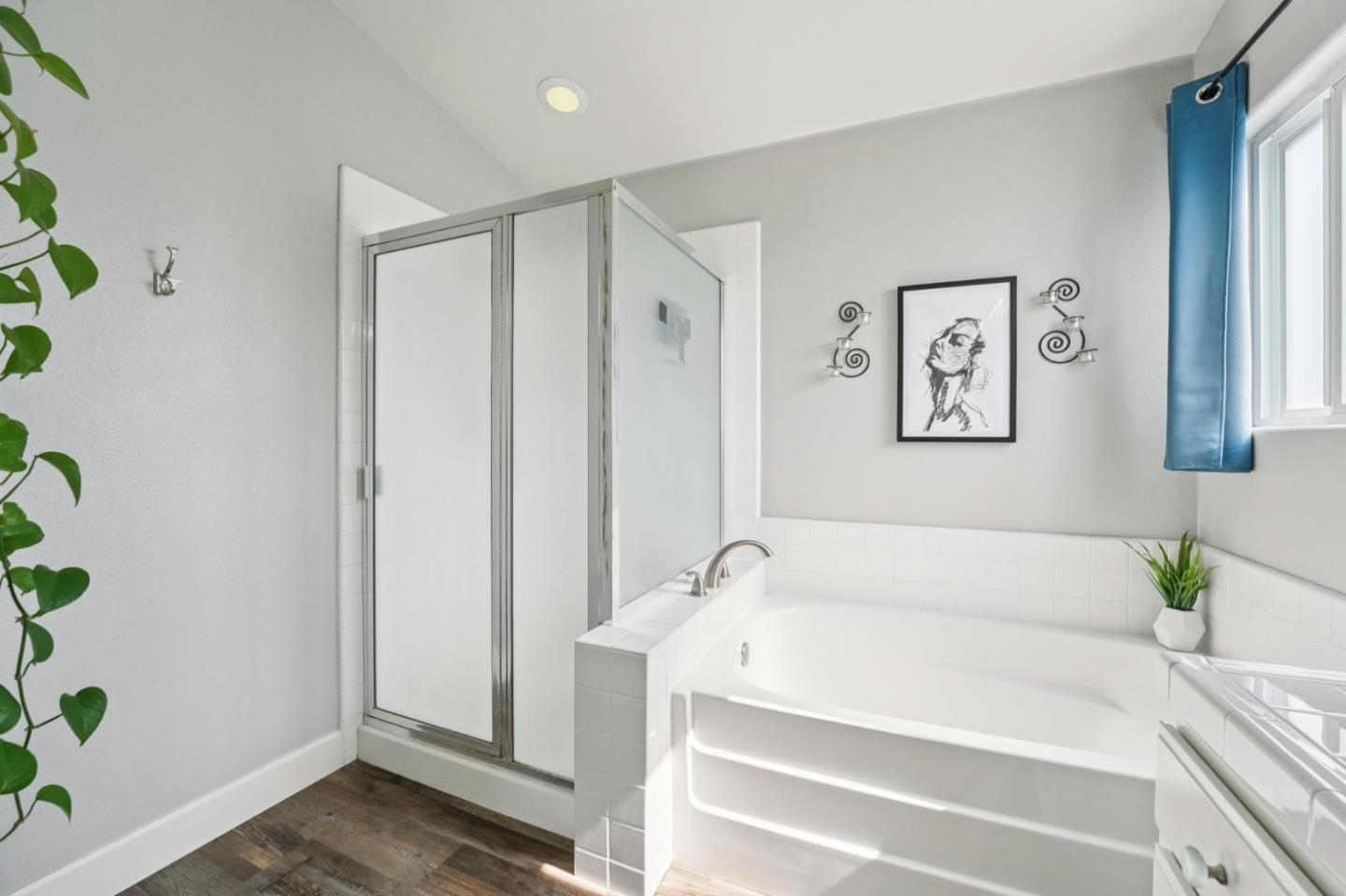 476 Arcadia Way Salinas, CA 93906 - Photo 19 of 40 a bathroom with a bathtub and shower