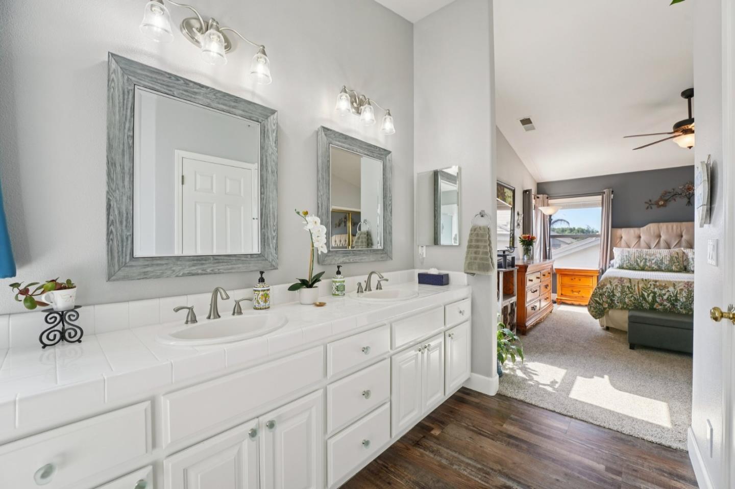 476 Arcadia Way Salinas, CA 93906 - Photo 20 of 40 a en suite bathroom with double sink and a mirror