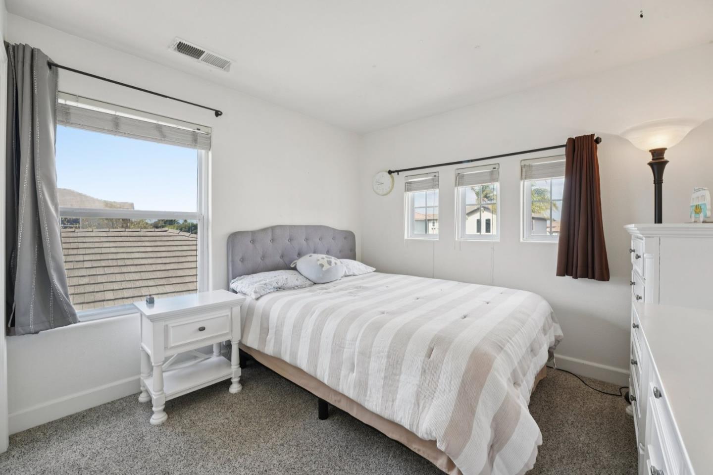 476 Arcadia Way Salinas, CA 93906 - Photo 23 of 40 a bedroom with a bed and a window