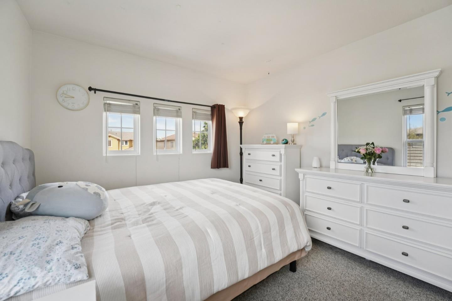 476 Arcadia Way Salinas, CA 93906 - Photo 24 of 40 a bedroom with a large bed and dresser with mirror