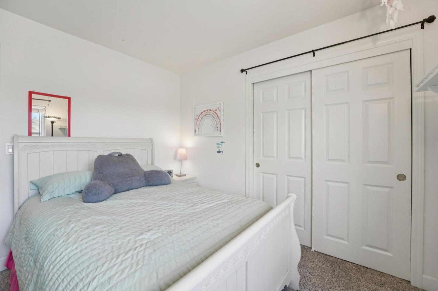 476 Arcadia Way Salinas, CA 93906 - Photo 25 of 40 a bedroom with a bed and a cabinets
