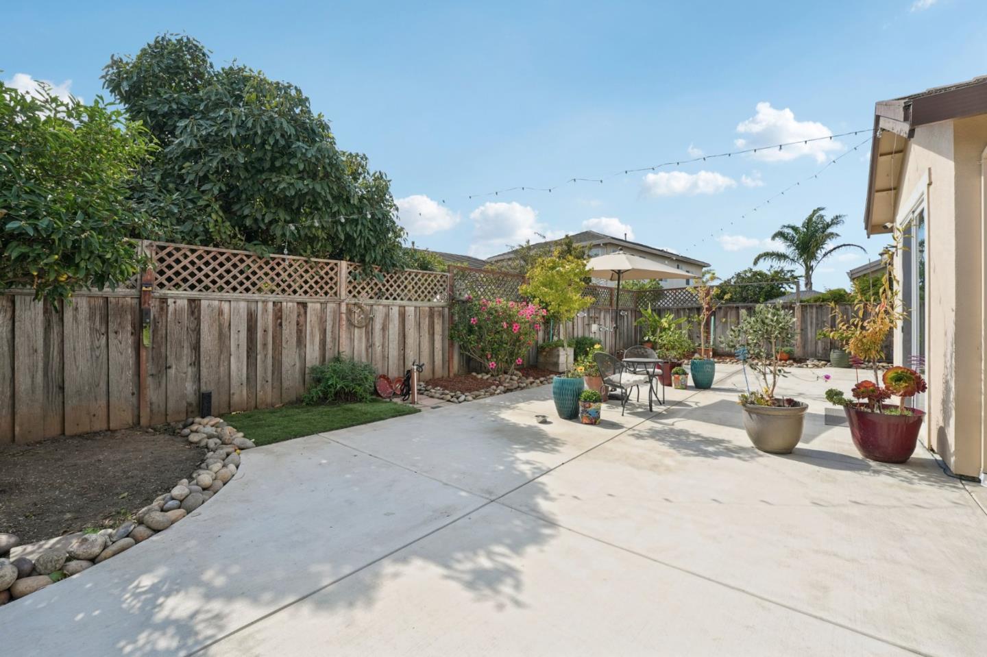 476 Arcadia Way Salinas, CA 93906 - Photo 30 of 40 a view of a patio with couches and potted plants
