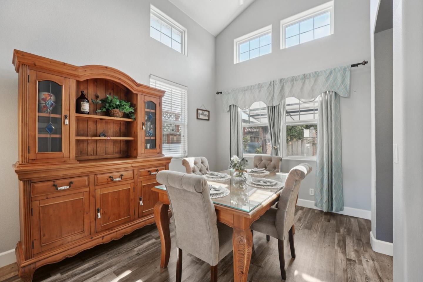 476 Arcadia Way Salinas, CA 93906 - Photo 5 of 40 a view of a dining room with furniture and wooden floor