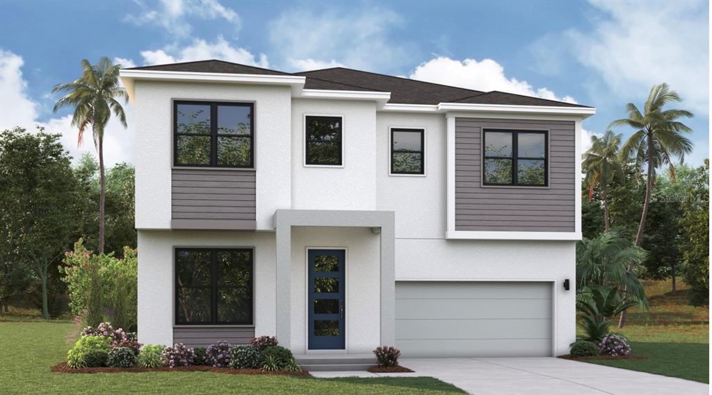 1712 West St Conrad Street Tampa, FL 33607 - Photo 1 of 2 a front view of a house with a yard