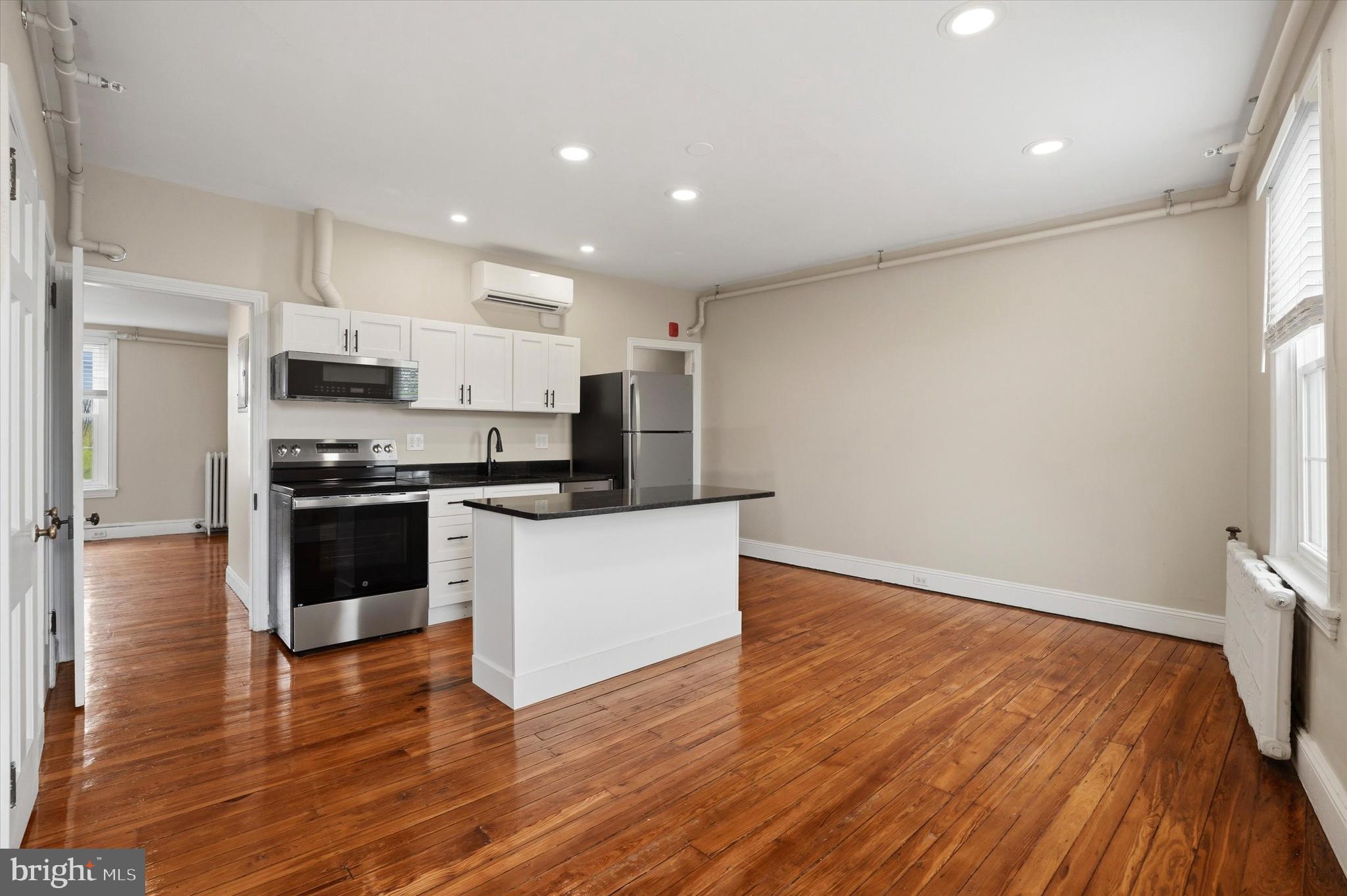 6113 Ridge Avenue, Unit 3 Philadelphia, PA 19128 - Photo 2 of 9 Kitchen / Living