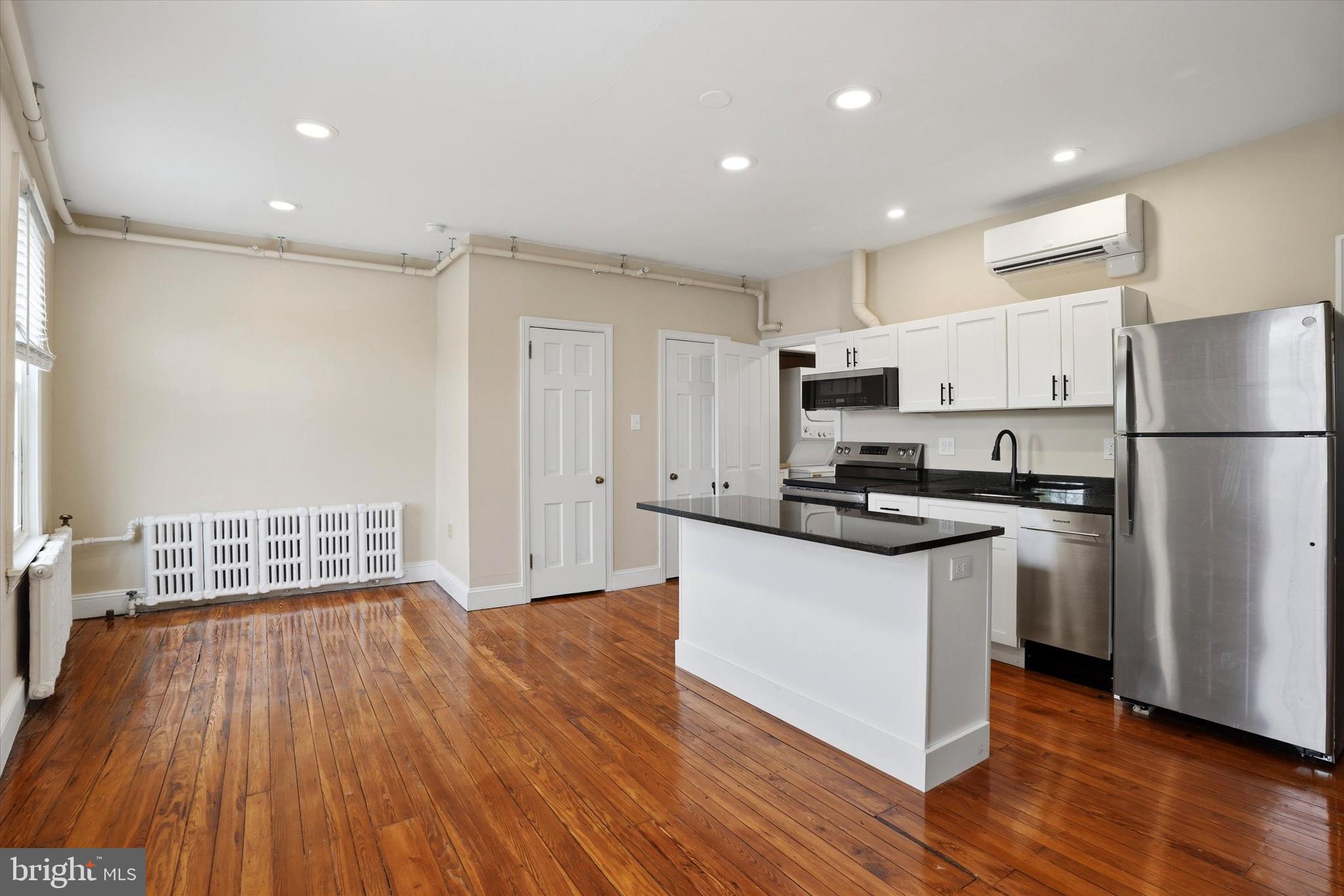 6113 Ridge Avenue, Unit 3 Philadelphia, PA 19128 - Photo 4 of 9 Kitchen / Living