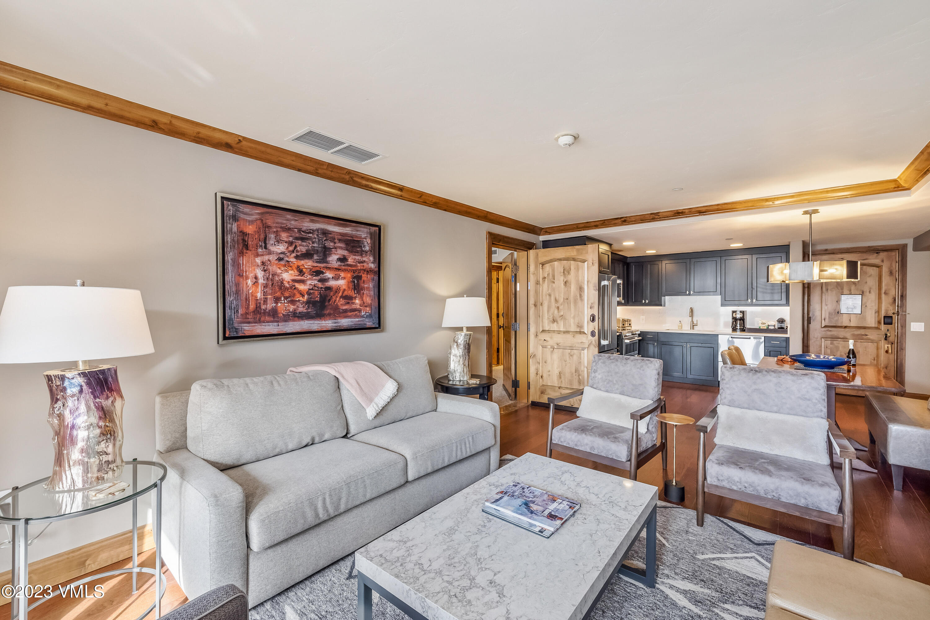 16 Vail Road, Unit RESORT MEMBERSHIP Vail, CO 81657 - Photo 16 of 51 a living room with furniture and a table