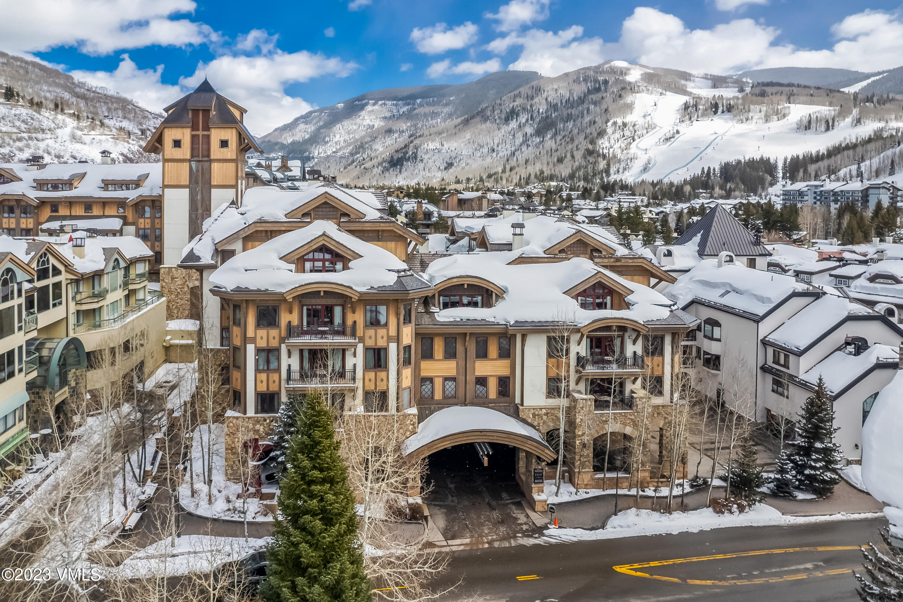 16 Vail Road, Unit RESORT MEMBERSHIP Vail, CO 81657 - Photo 19 of 51 a view of multiple houses with a street