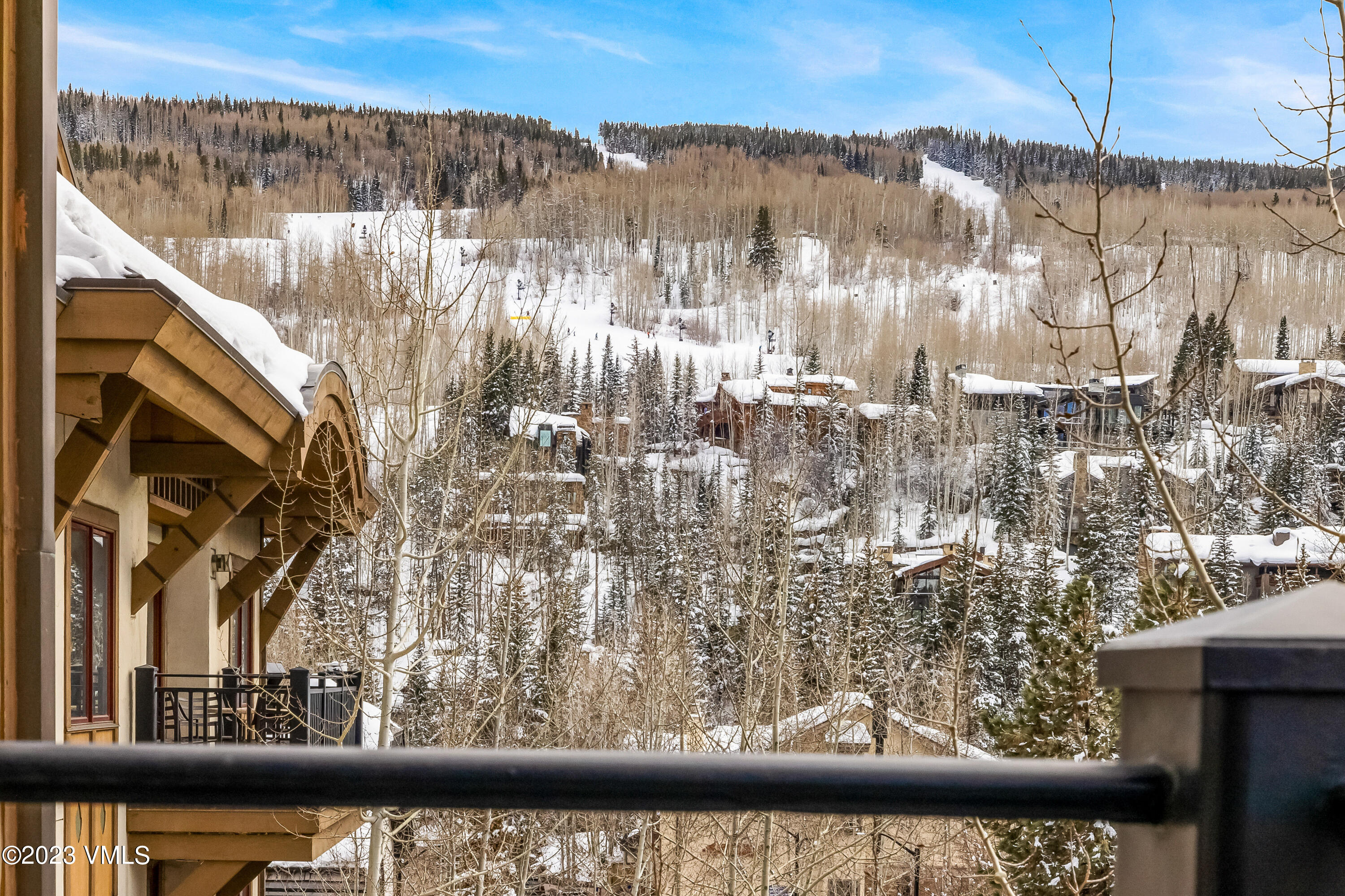 16 Vail Road, Unit RESORT MEMBERSHIP Vail, CO 81657 - Photo 28 of 51 a view of a lake from a balcony