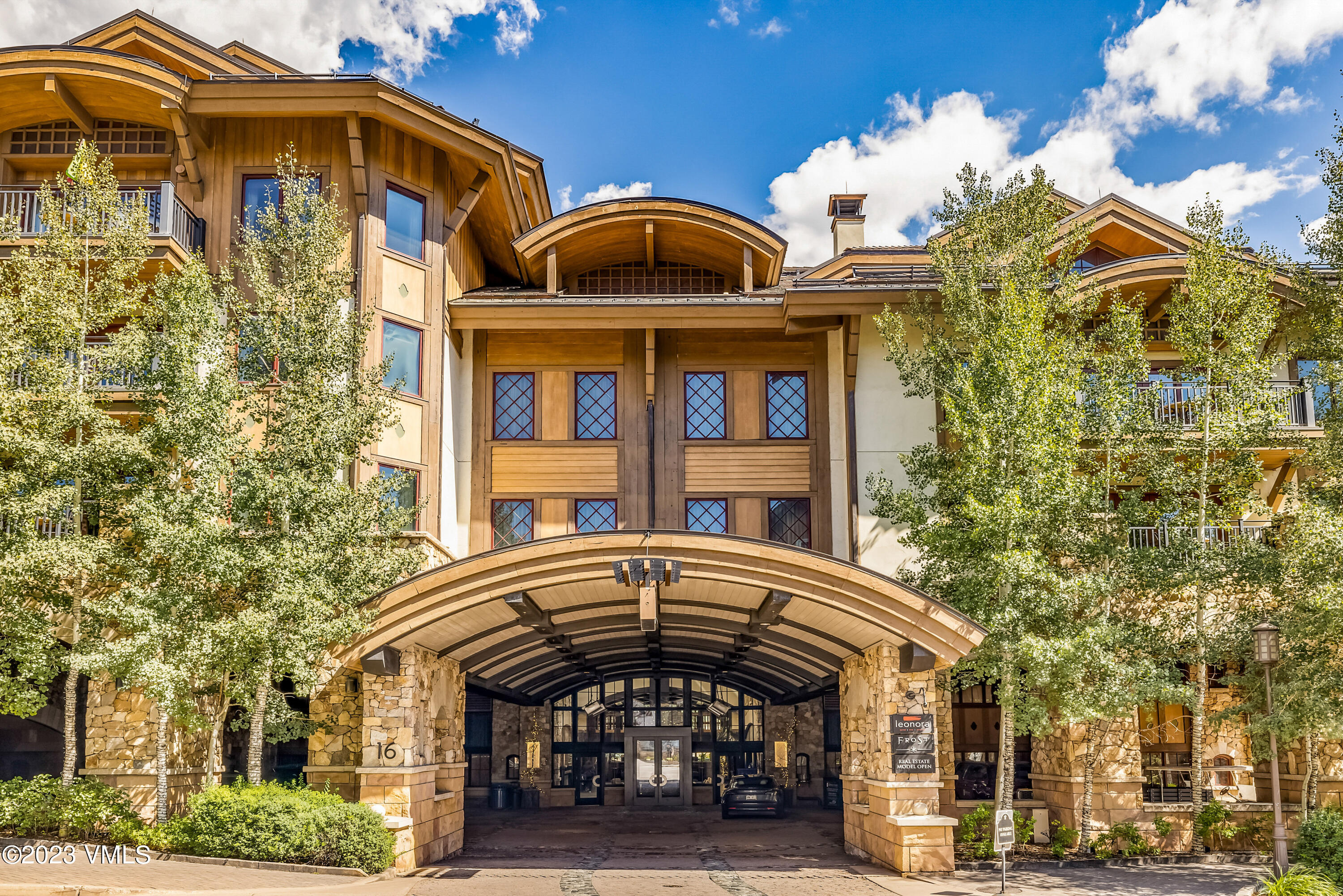 16 Vail Road, Unit RESORT MEMBERSHIP Vail, CO 81657 - Photo 3 of 51 front view of a building with a lot of windows